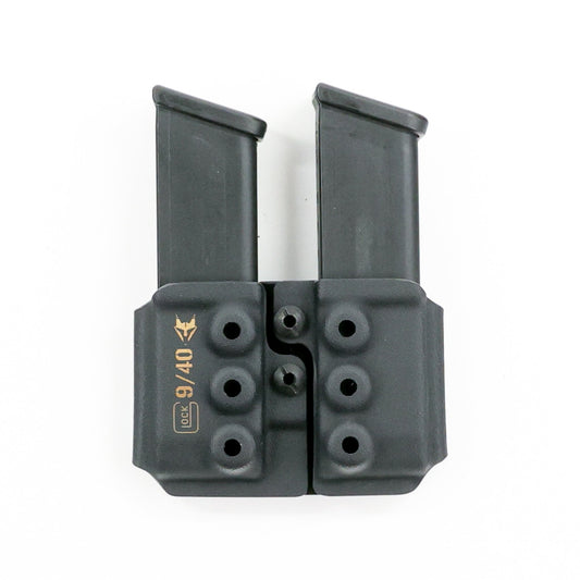 Rear view of the Specter Glock 9 mm/.40 S&W double magazine carrier showing the mounting pattern