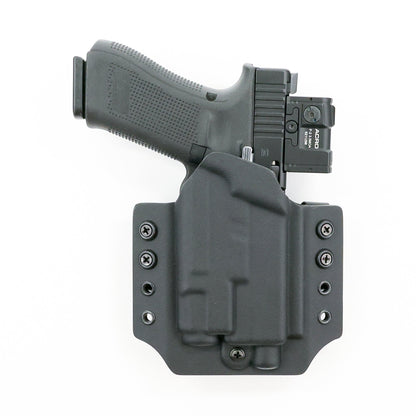 Basilisk light-bearing OWB Kydex holster with optic-equipped Glock pistol – front view