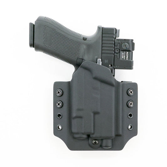 Basilisk light-bearing OWB Kydex holster with optic-equipped Glock pistol – front view