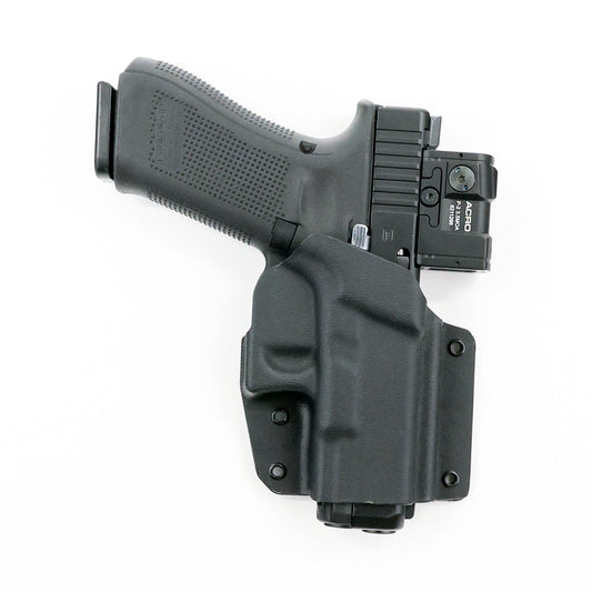 Hybrid off-body Kydex holster with optic-equipped Glock pistol – front view