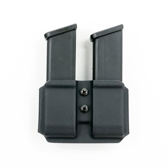 Specter Kydex double magazine carrier holding two Glock 9 mm/.40 S&W magazines – front view