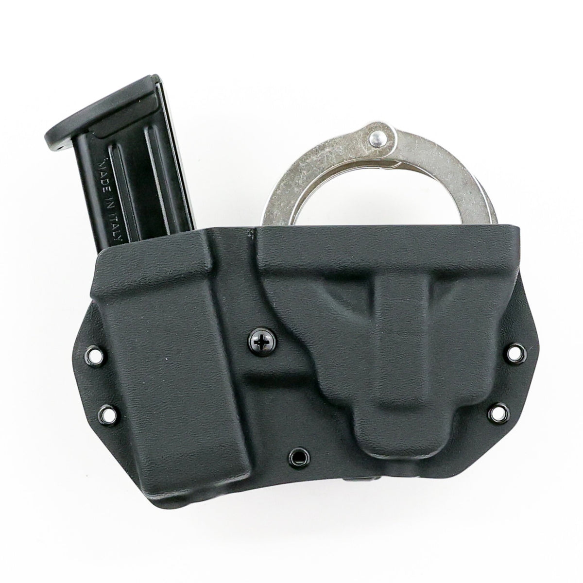 Vesta Kydex carrier holding chained handcuffs and a double-stack metal pistol magazine