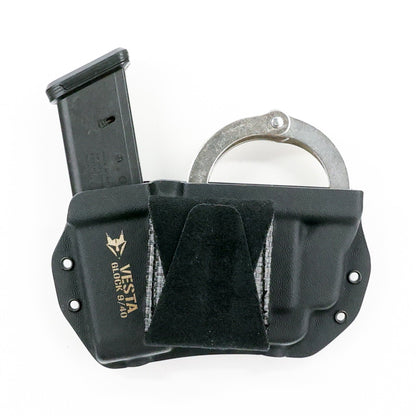 Vesta handcuff and magazine carrier with Squeeze XL belt attachment – closed position