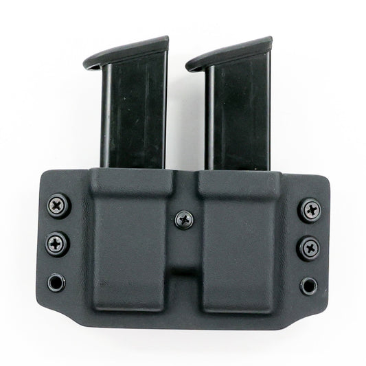 Wyvern Kydex carrier holding two 9 mm/.40 S&W double-stack magazines – front view