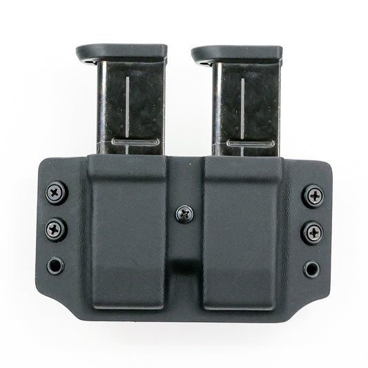 Wyvern Kydex carrier holding two double-stack .45 ACP pistol magazines – front view