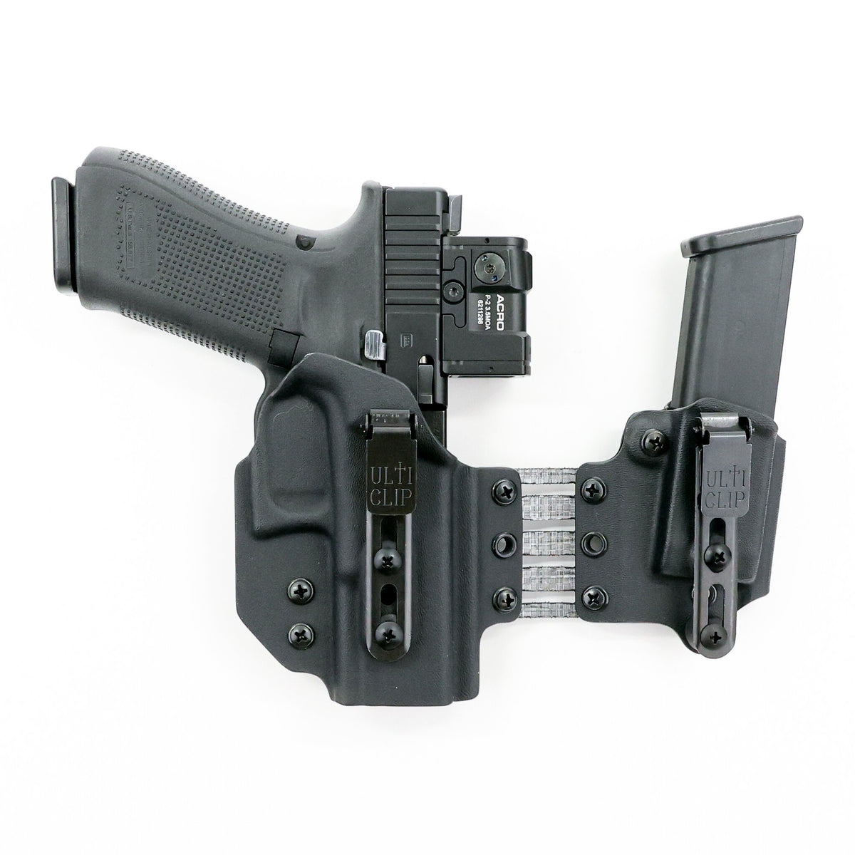 Front view of the Shadow appendix holster system showing dual UltiClip Slim 3.3 clips, adjustable Tegris bridge and spare magazine