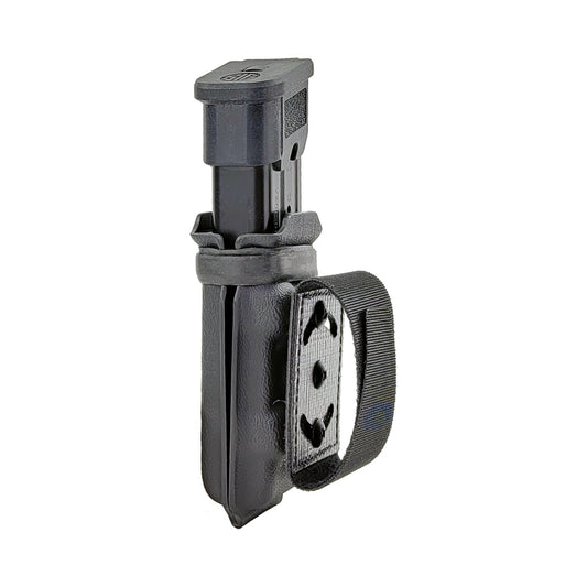 Squeeze low-profile belt attachment mounted to a pistol magazine carrier – angled view