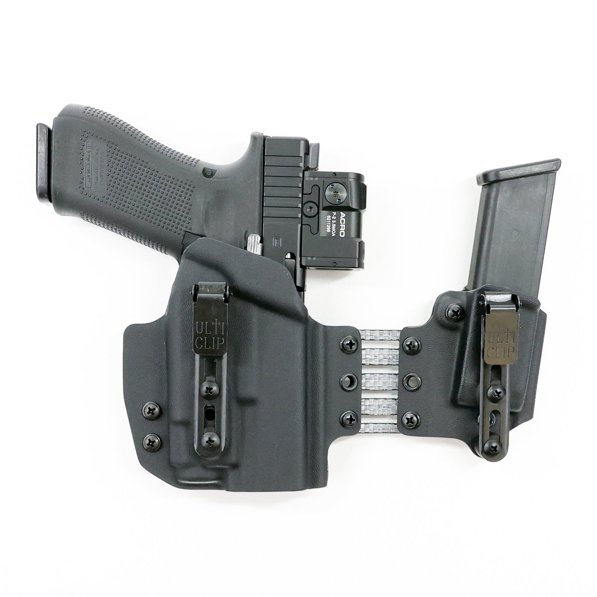 Front view of the Umbra light-bearing appendix holster system showing dual UltiClip Slim 3.3 clips and adjustable Tegris bridge